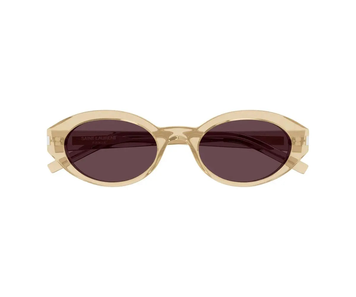 Sunglasses with a beige frame and dark lenses on a white background