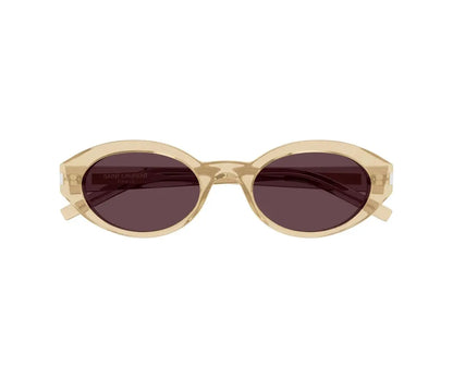 Sunglasses with a beige frame and dark lenses on a white background