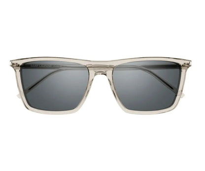 Sunglasses with clear frame and dark lenses on a white background