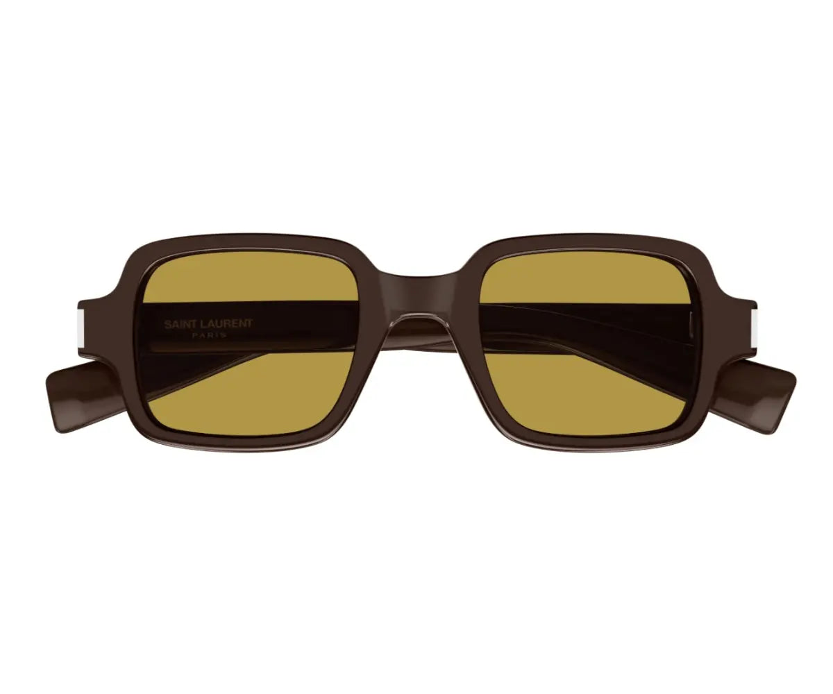 Sunglasses with brown frame and yellow-tinted lenses on a white background