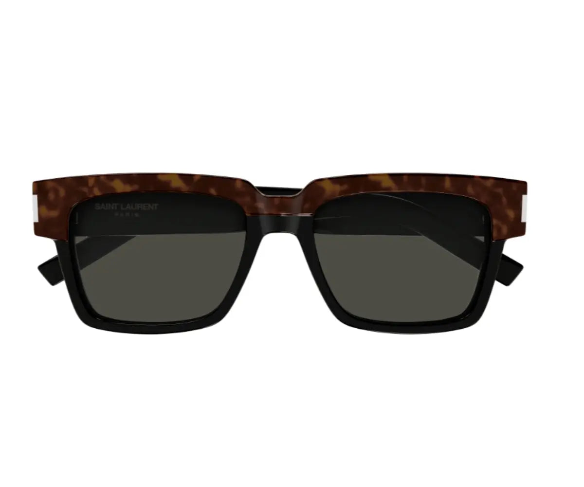 Sunglasses with tortoiseshell frame and dark lenses on a white background