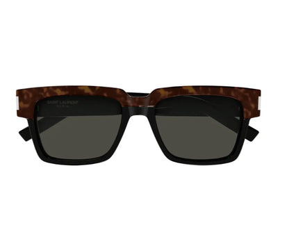 Sunglasses with tortoiseshell frame and dark lenses on a white background