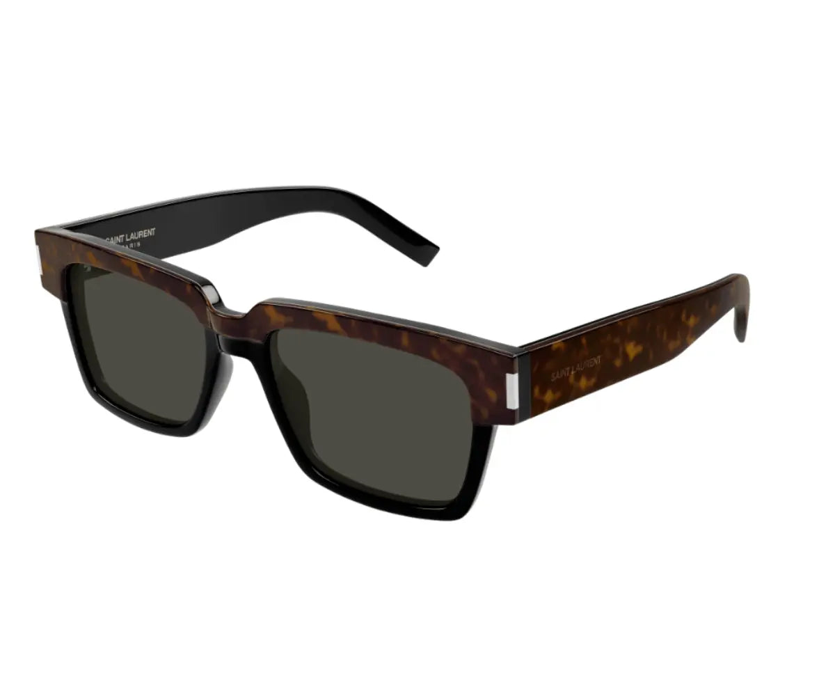 Sunglasses with tortoiseshell frame and dark lenses on a white background