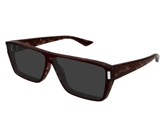 Sunglasses with tortoiseshell frame and dark lenses on a white background