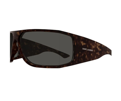 Sunglasses with tortoiseshell frame and dark lenses on a white background