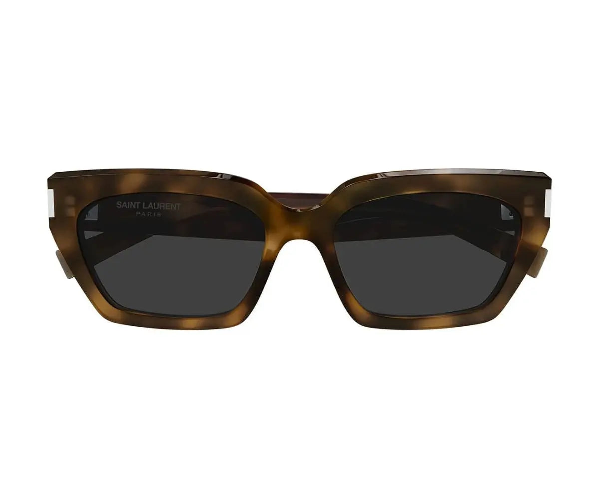 Sunglasses with tortoiseshell frame and dark lenses on a white background