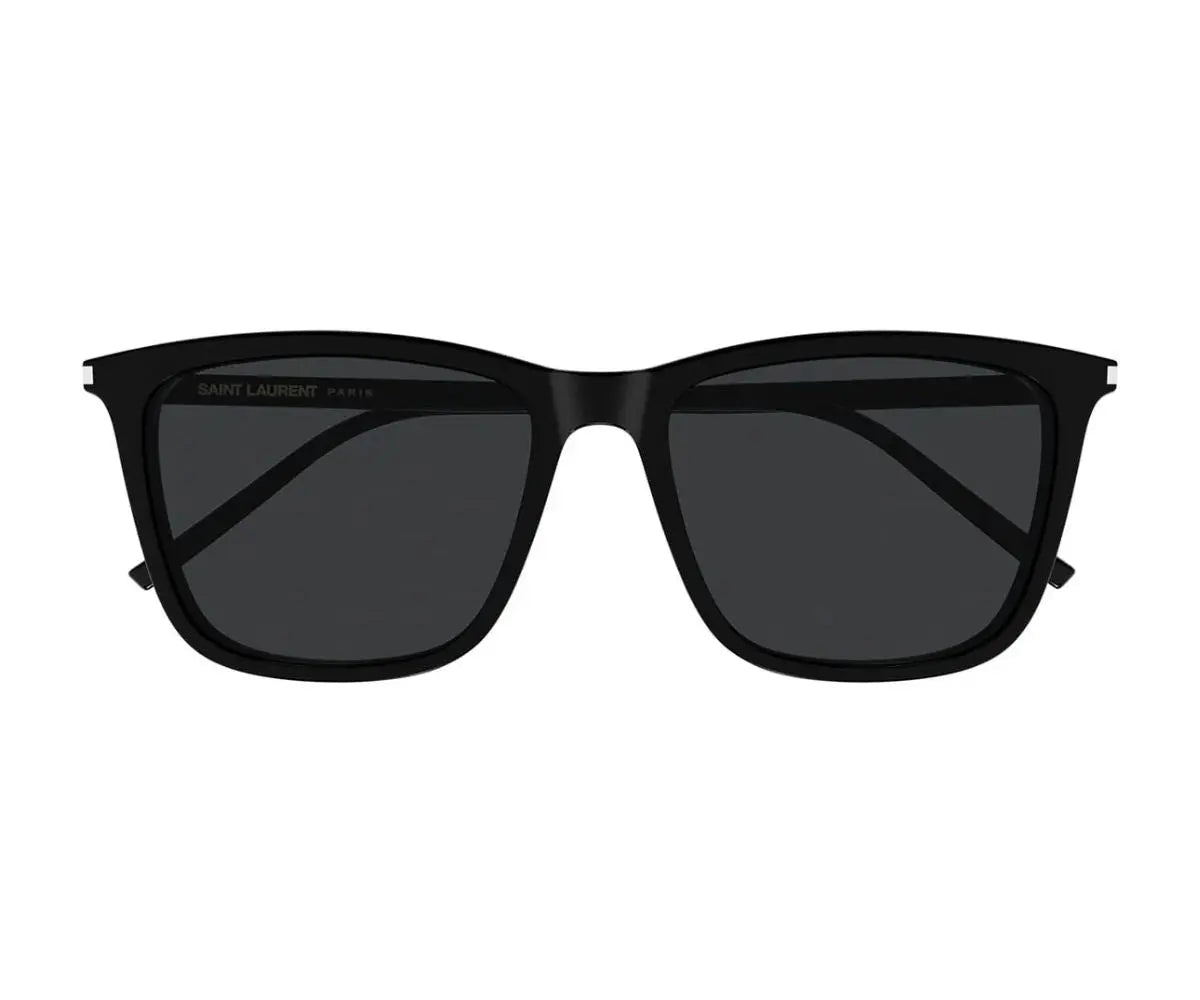 Black sunglasses with dark lenses on a white background