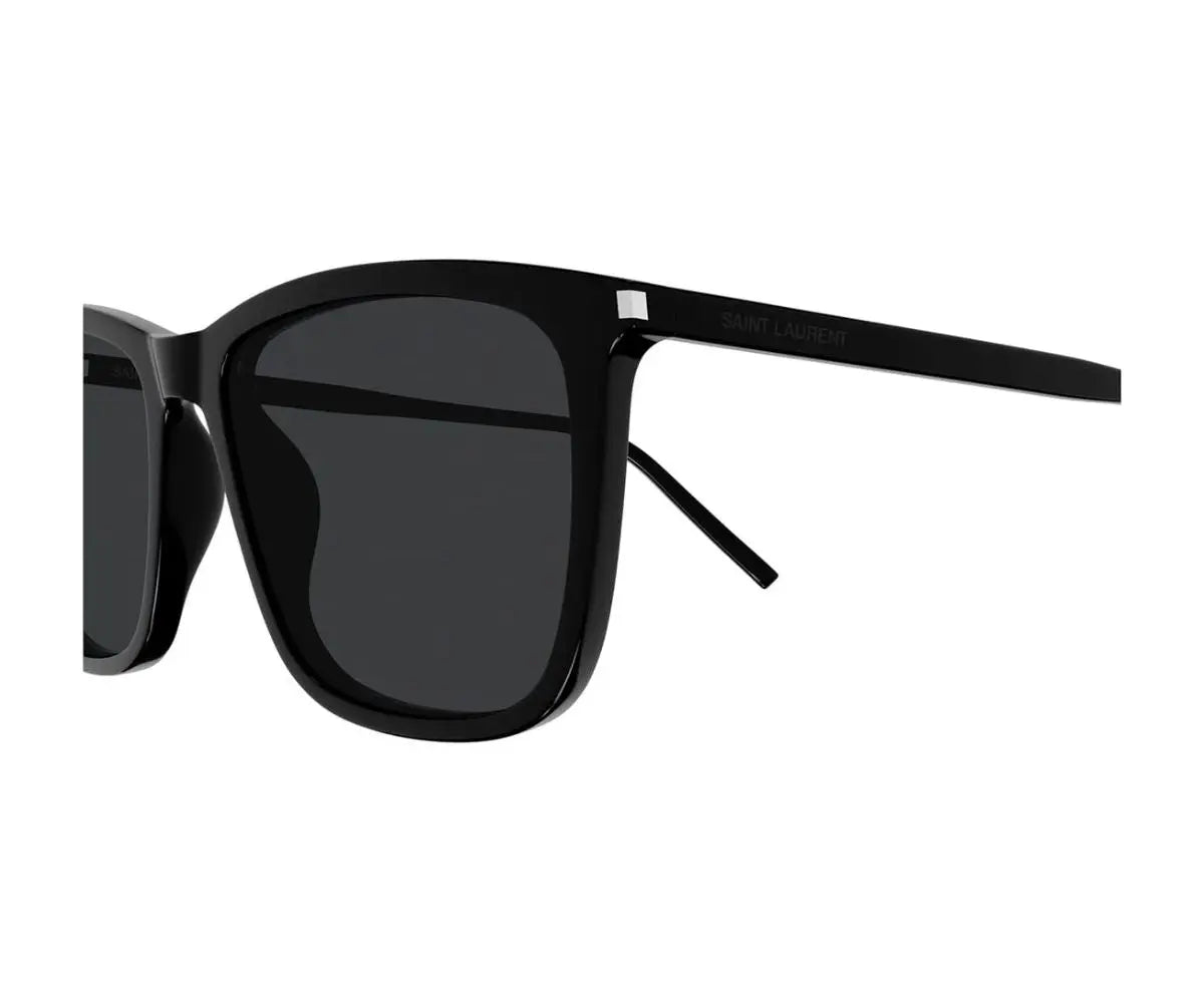 Black sunglasses with dark lenses on a white background