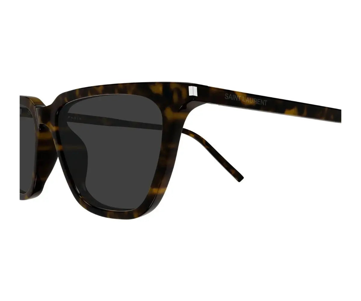 Black sunglasses with a brand logo on a white background