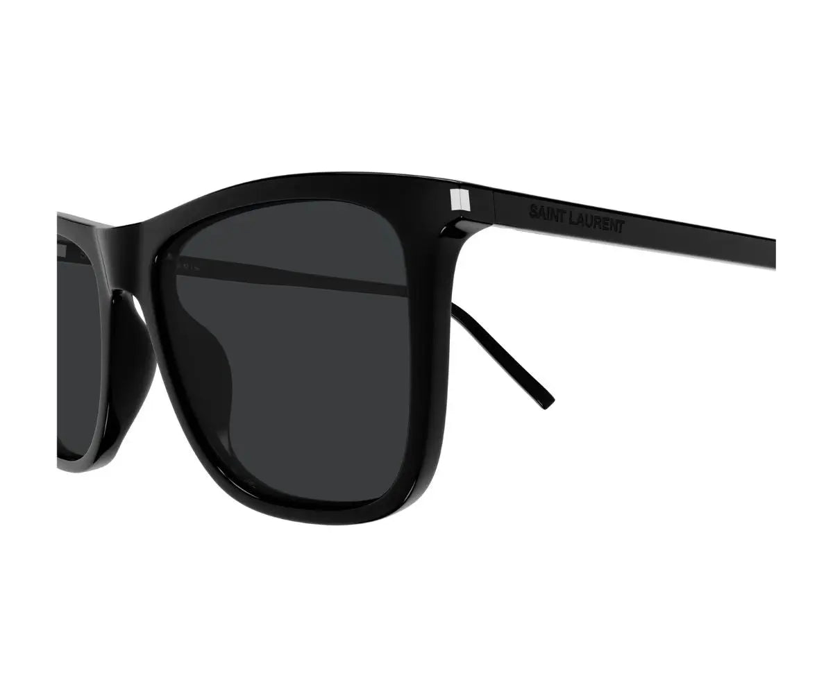 Black sunglasses with a brand logo on a white background