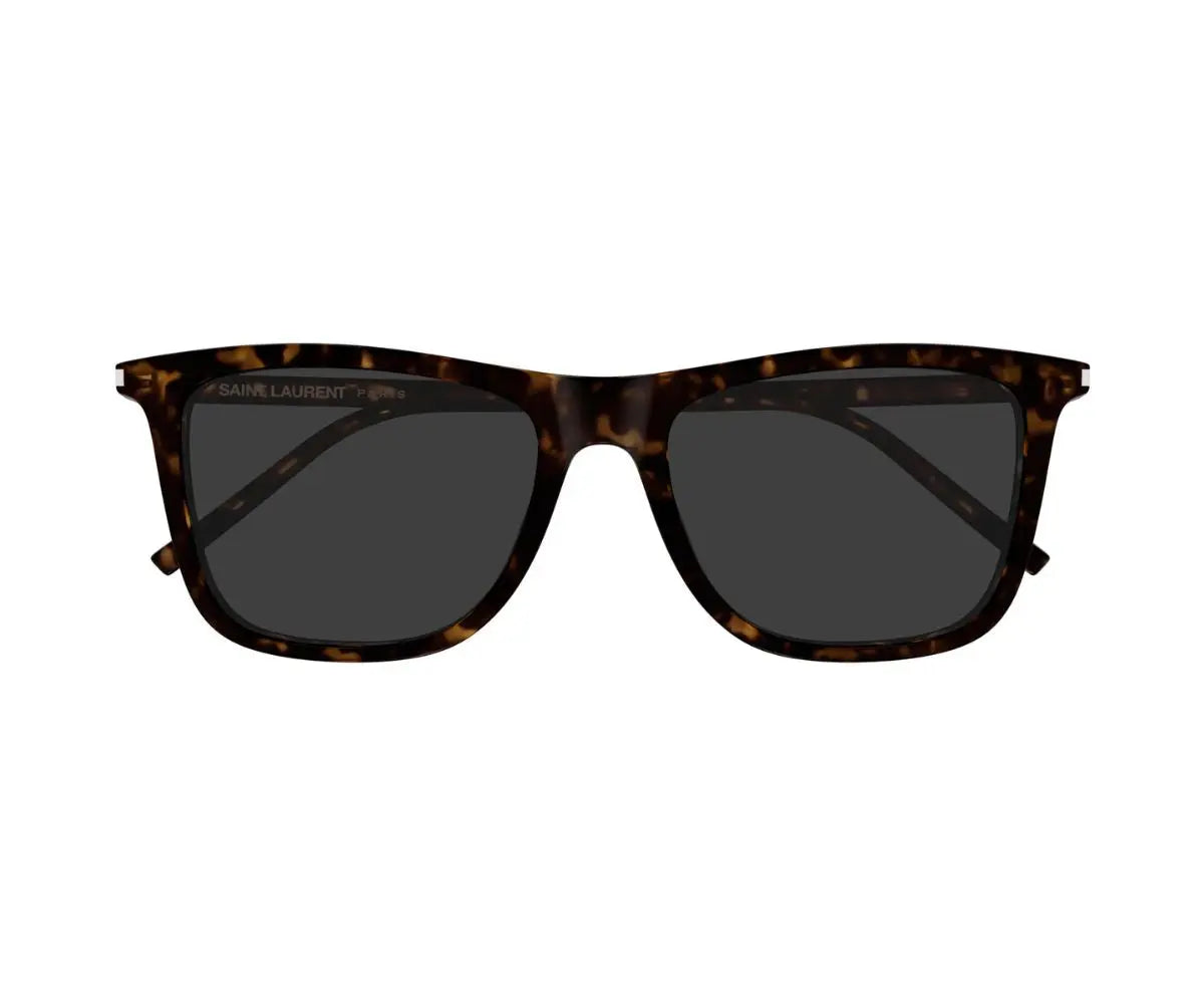 Sunglasses with tortoiseshell frame and dark lenses on a white background