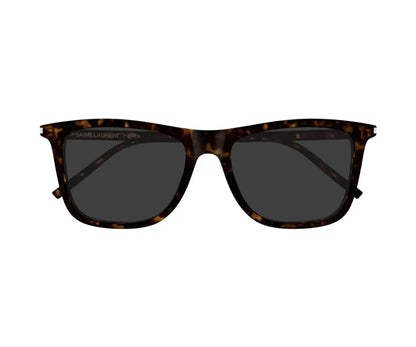 Sunglasses with tortoiseshell frame and dark lenses on a white background