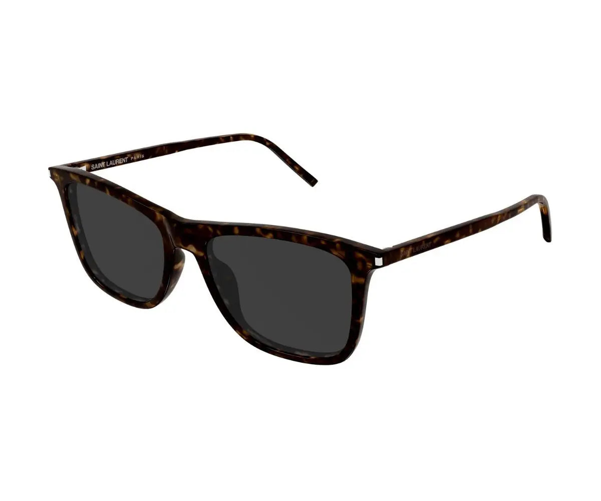 Sunglasses with tortoiseshell frame and dark lenses on a white background