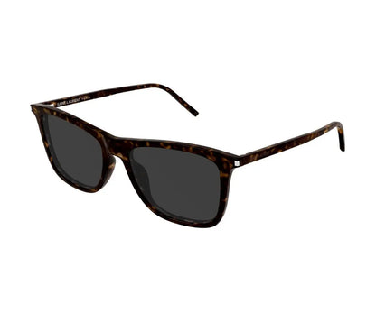 Sunglasses with tortoiseshell frame and dark lenses on a white background