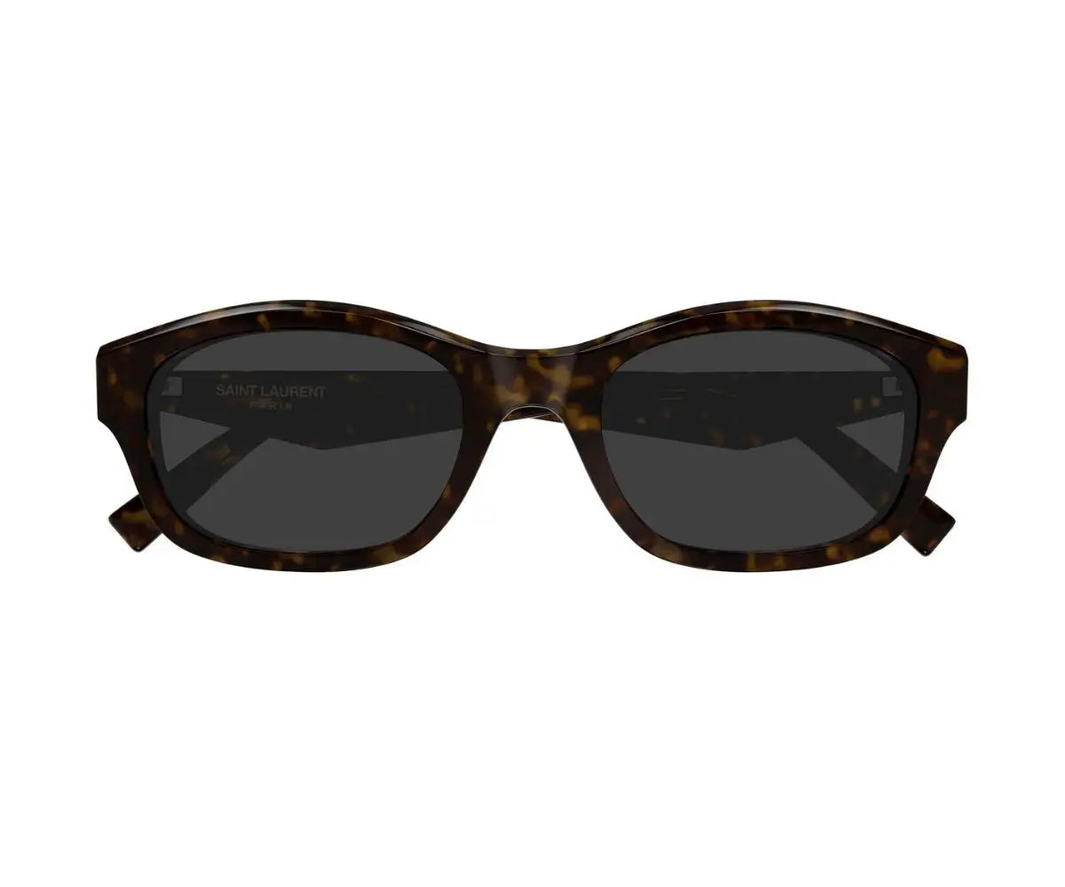 Sunglasses with tortoiseshell frame and dark lenses on a white background