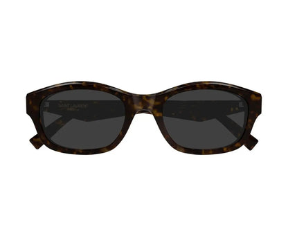 Sunglasses with tortoiseshell frame and dark lenses on a white background
