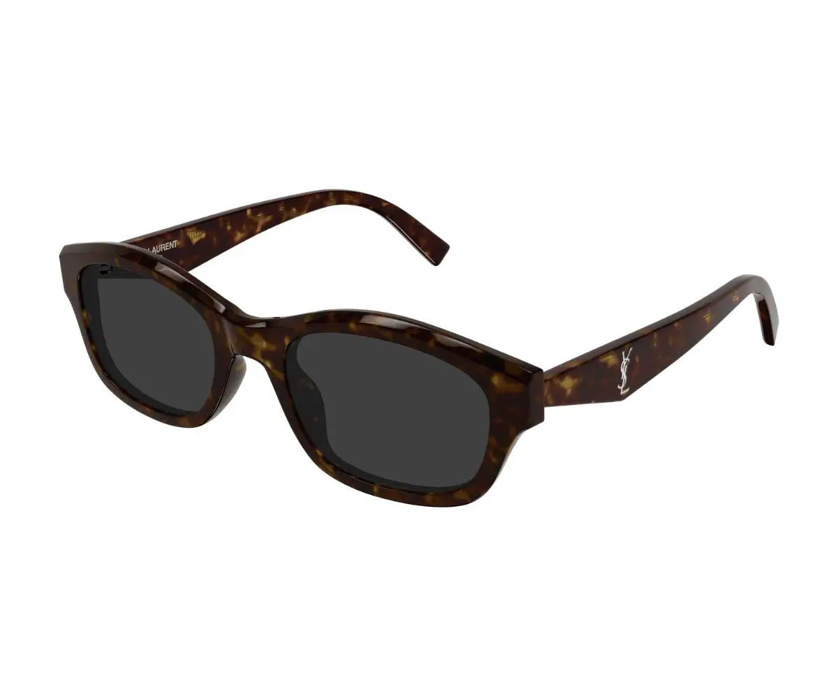 Sunglasses with tortoiseshell frame and dark lenses on a white background