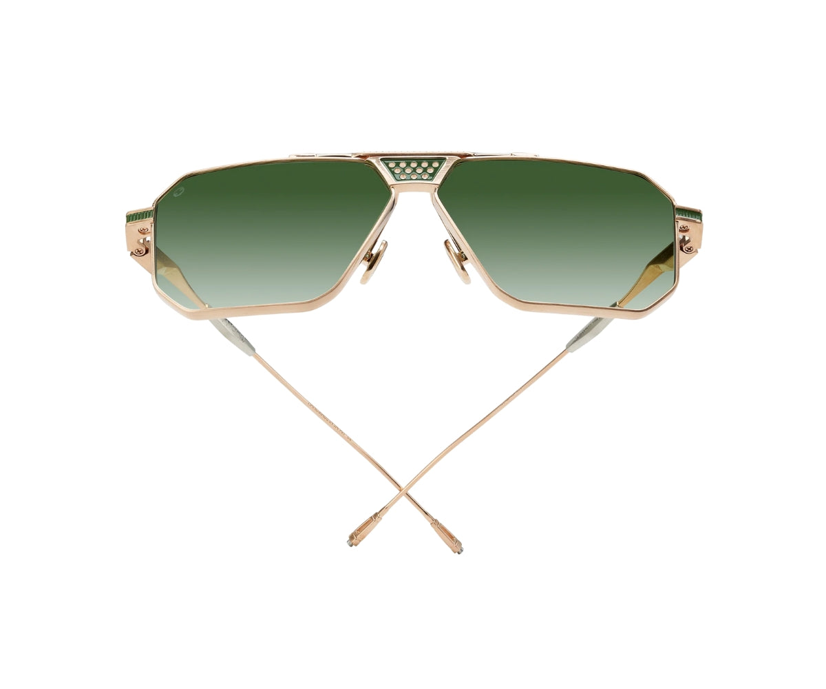 Gold-framed sunglasses with green gradient lenses on a white background