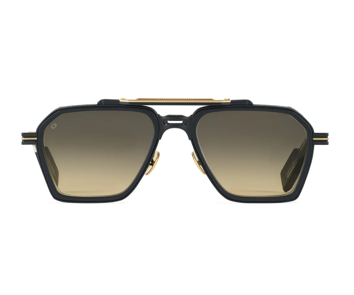 Sunglasses with black frame and gold accents on a white background