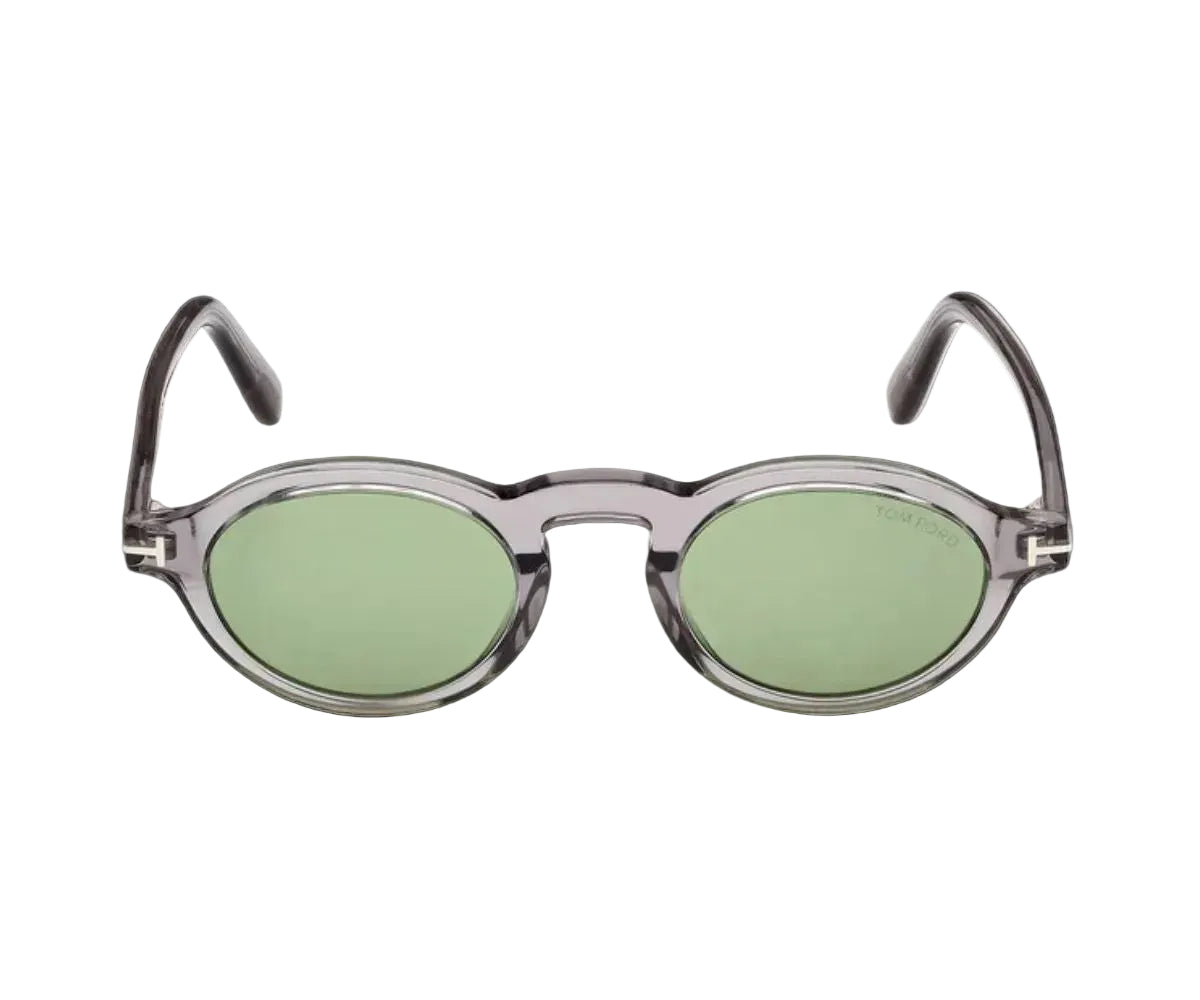Sunglasses with green lenses and gray frames on a white background