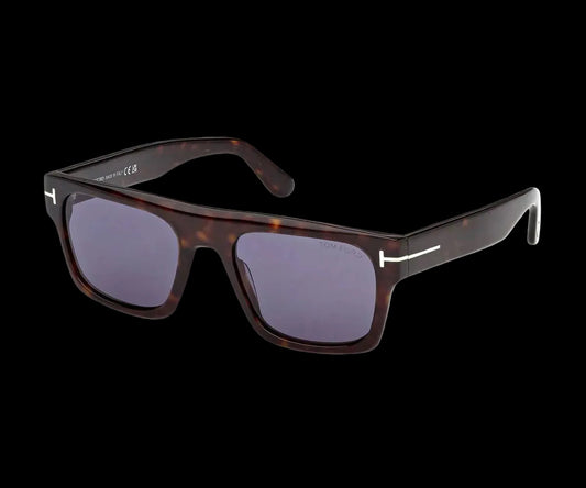 Sunglasses with tortoiseshell frame and dark lenses on a white background