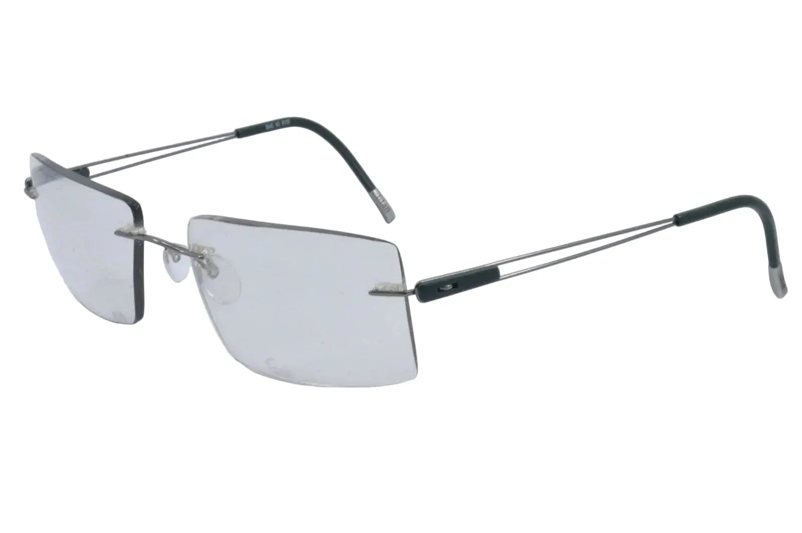 Silver rimless eyeglasses on a white background