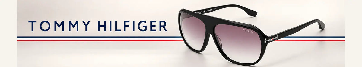 Tommy Hilfiger TH2640 C1 black sunglasses with gradient lenses on a premium ivory background