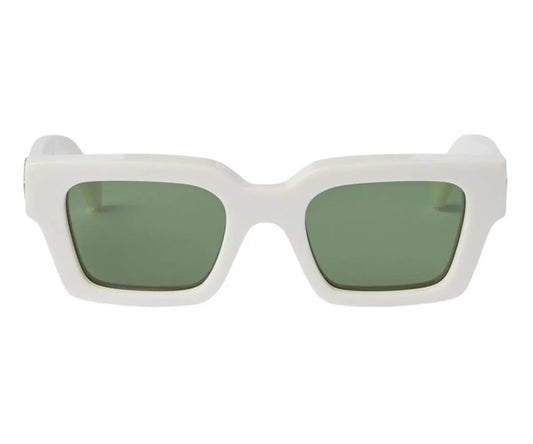 White sunglasses with green lenses on a white background